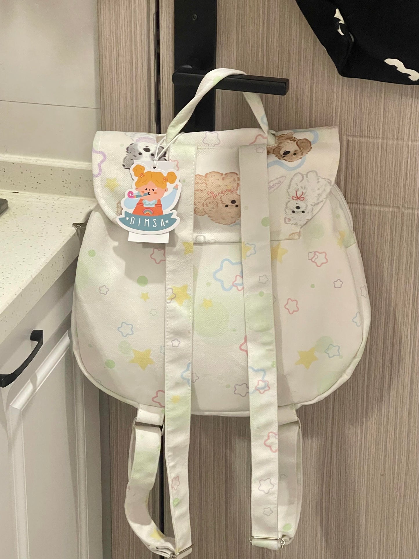 Cute cartoon dog backpack .