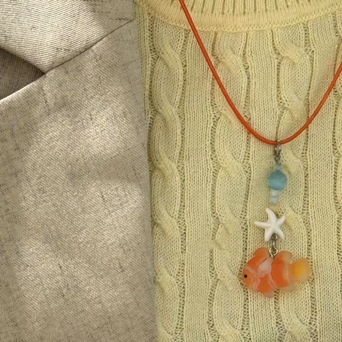 Goldfish necklace.